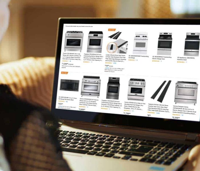Woman-online-shopping-buying-oven-online-using-laptop